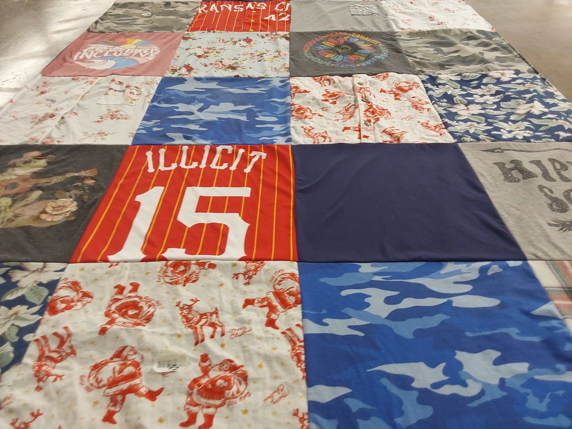 T-shirt quilt with sports themes by Stormy from KS