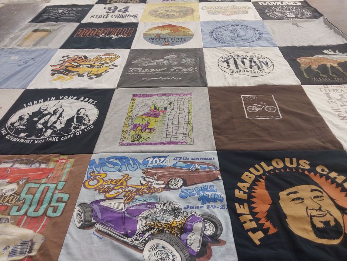 T-shirt quilt with automobiles, sports themes by Sara from IL