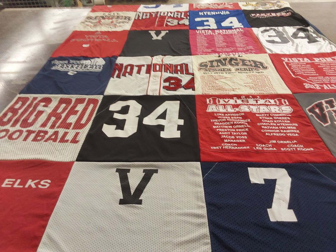 T-shirt quilt featuring vista all-stars, big red football by Eric from CA
