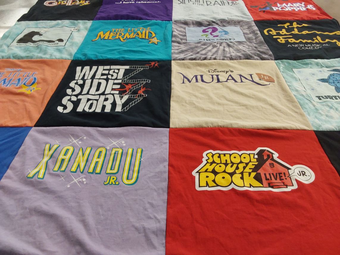T-shirt quilt with theater, musicals themes by Julia from MD