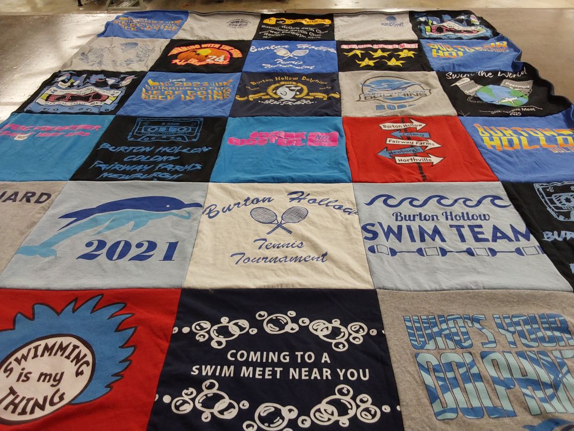 T-shirt quilt featuring burton hollow swim team by Becky from MI