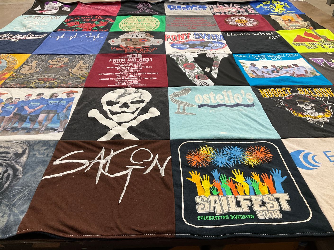 T-shirt quilt with music, community events themes by Barbara from CT