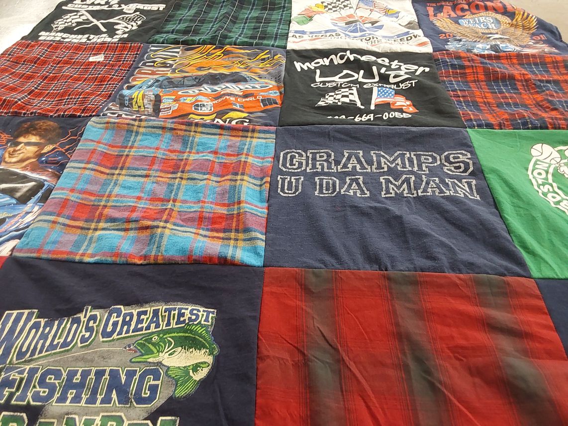 T-shirt quilt with fishing, nascar themes by Laurie from NH