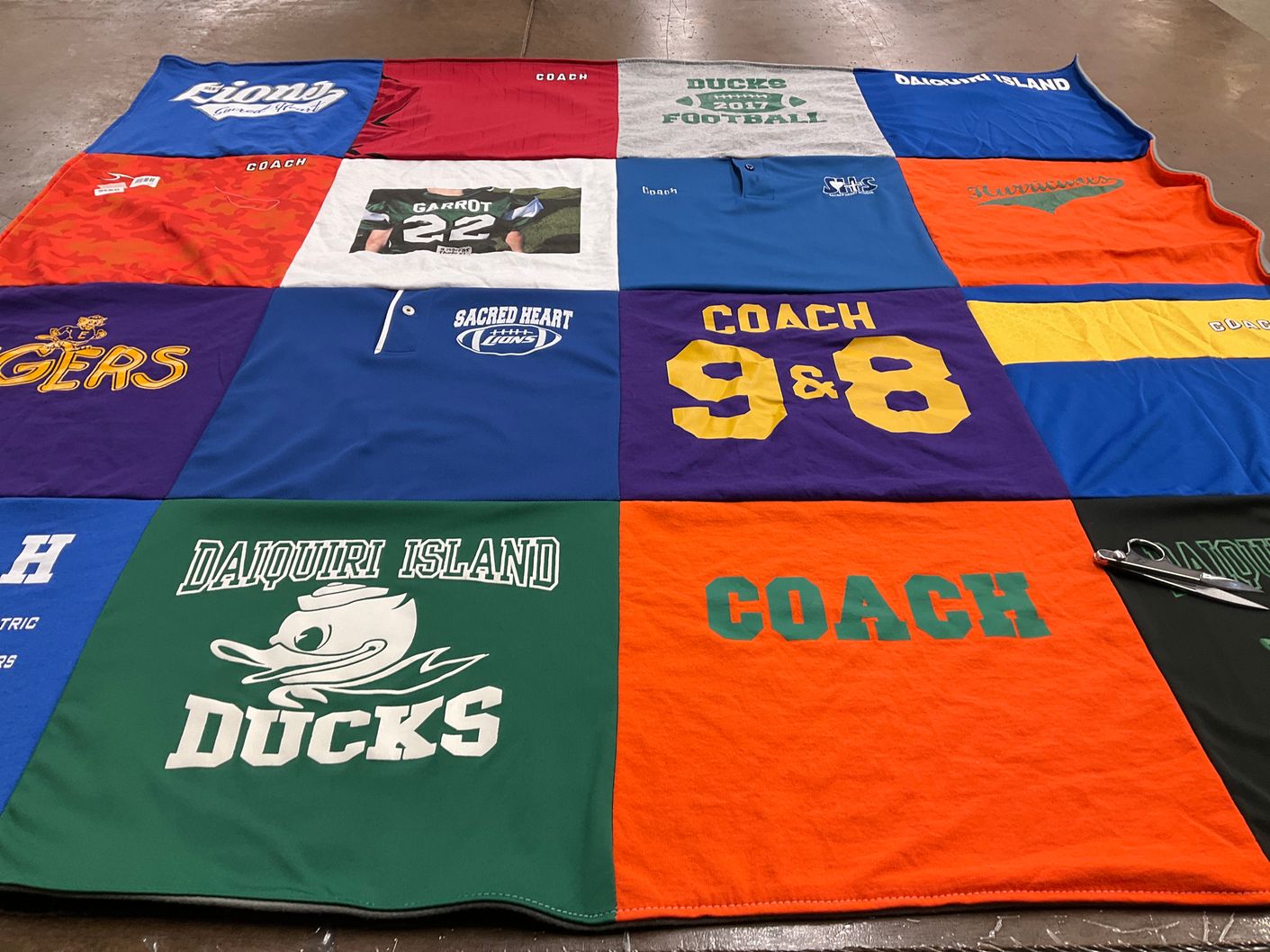 T-shirt quilt featuring daiquiri island ducks, lions by Kaleigh from LA