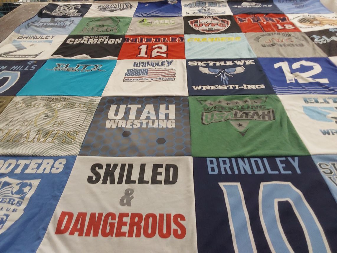 T-shirt quilt featuring skyhawk wrestling by Candice from UT