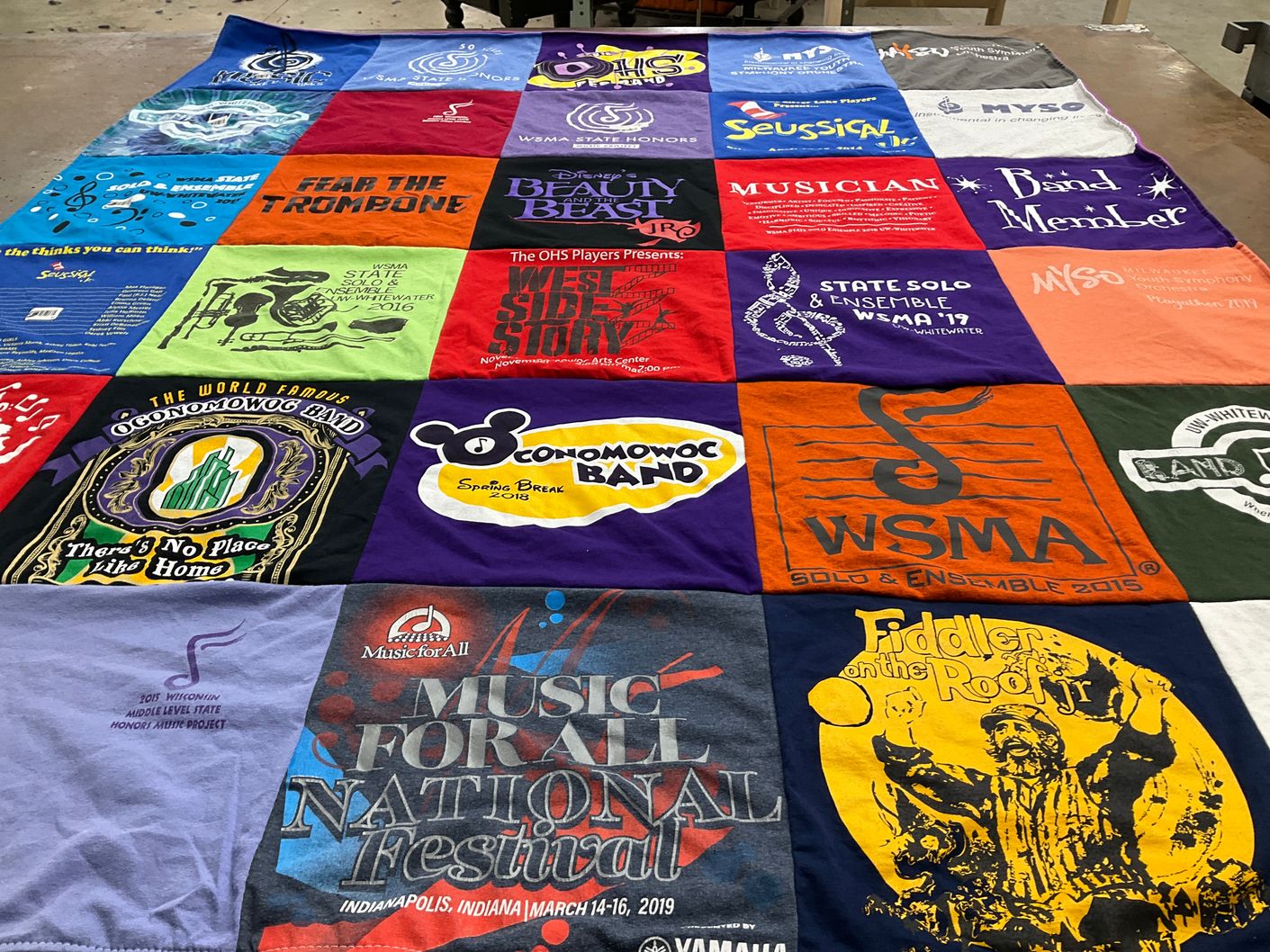 T-shirt quilt from oconomowoc high school by Kathleen from WI