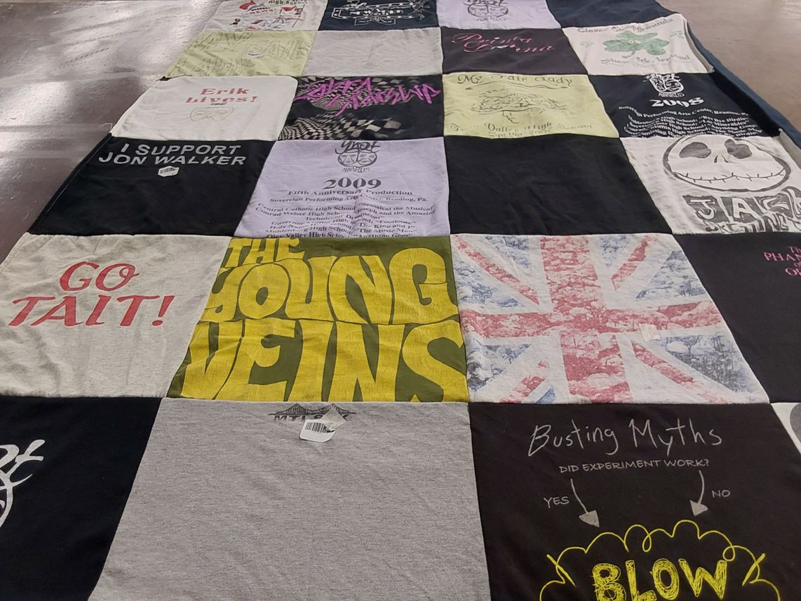 T-shirt quilt with experimenting, supporting causes themes by Janet from DE