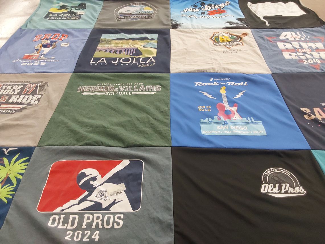T-shirt quilt with running, sports themes by Kim from CA