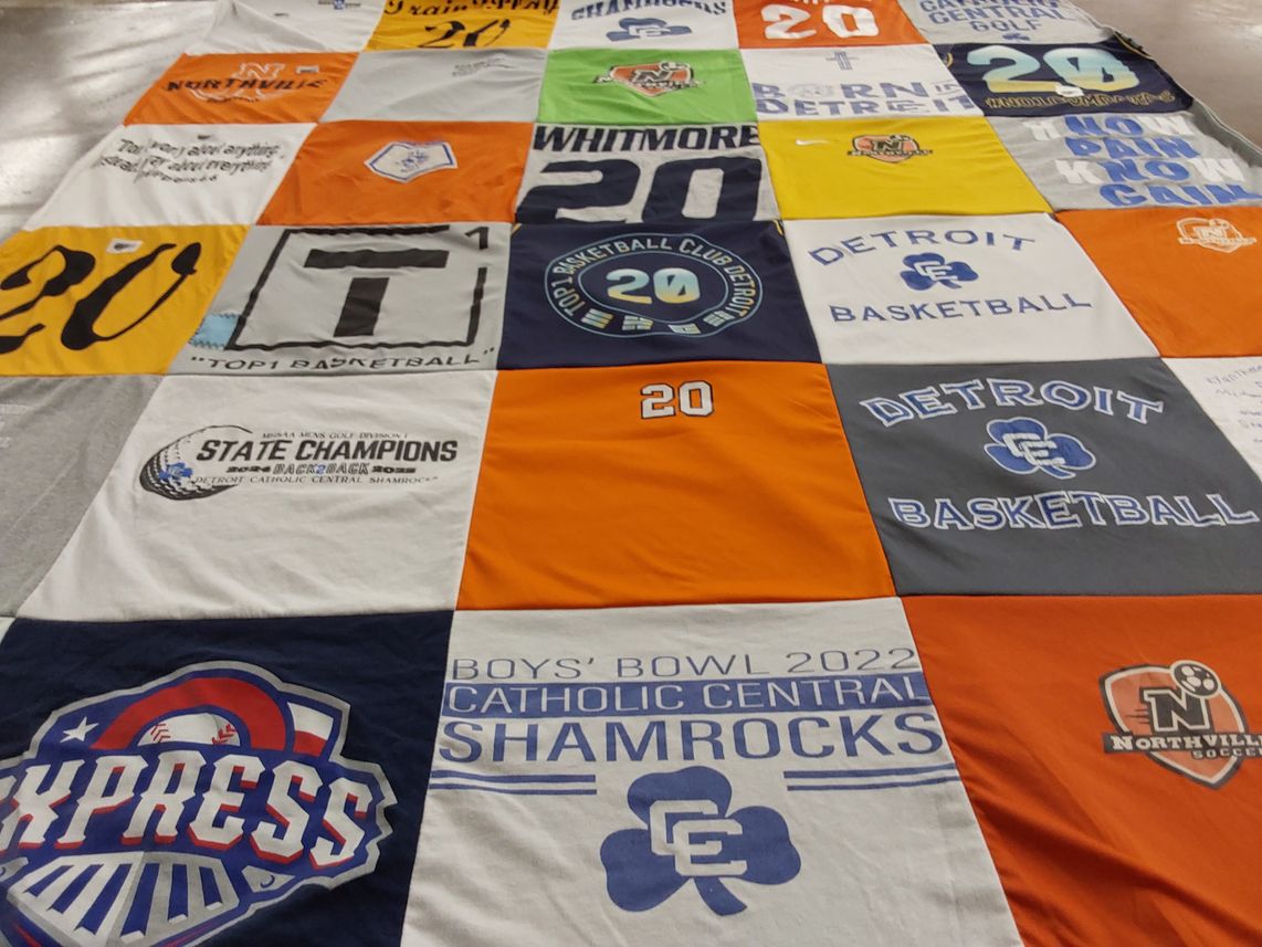 T-shirt quilt featuring detroit basketball, northville soccer by Lisa from MI