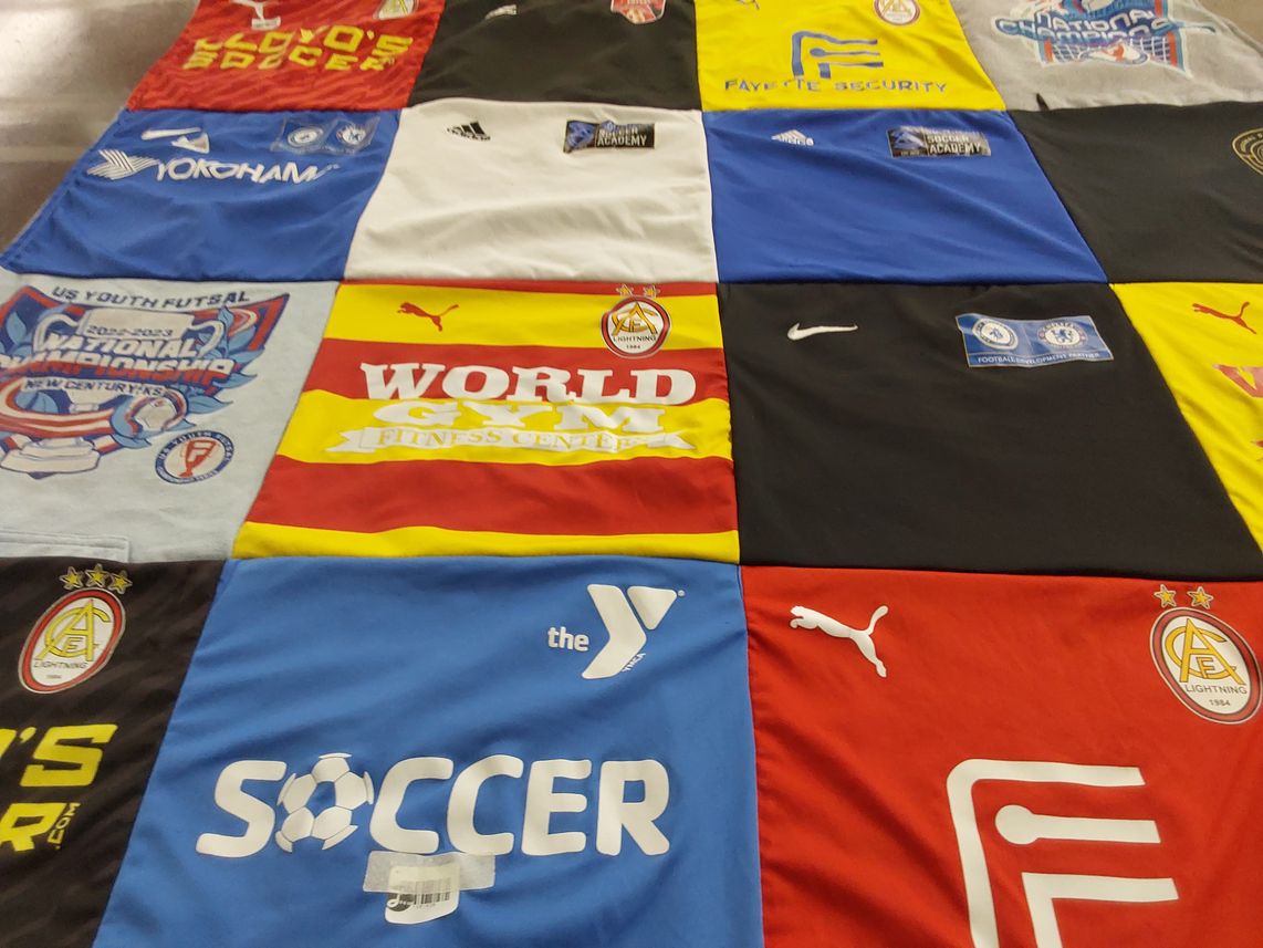 T-shirt quilt featuring lightning by Kristin from GA