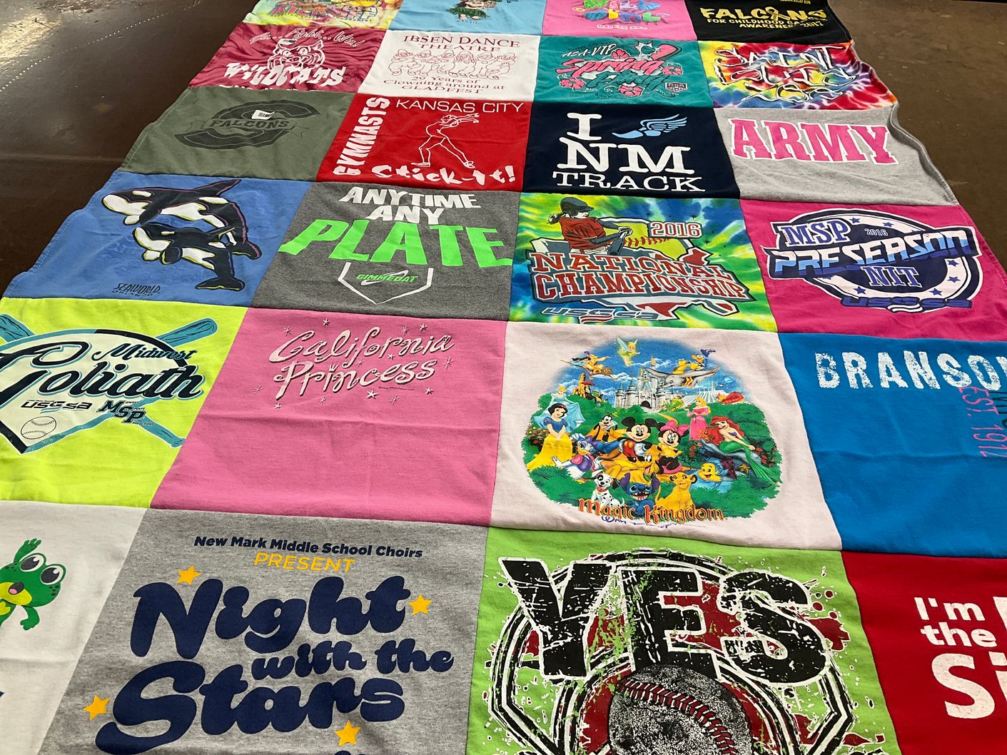 T-shirt quilt with sports, music themes by Nicole from MO