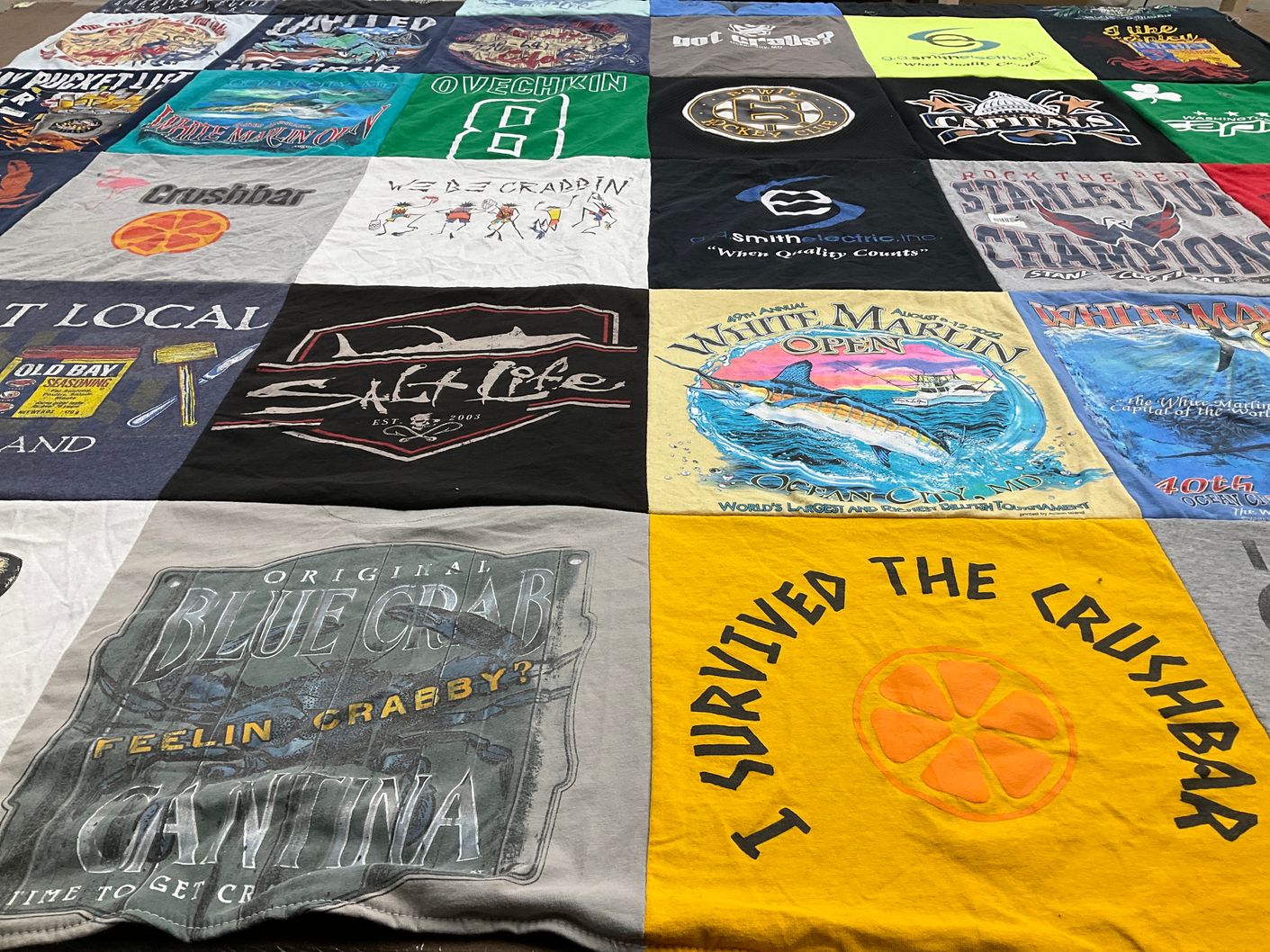 T-shirt quilt with fishing, seafood themes by Marcia from MD