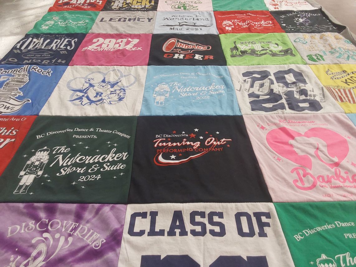 T-shirt quilt with dance, theater themes by Christine from PA
