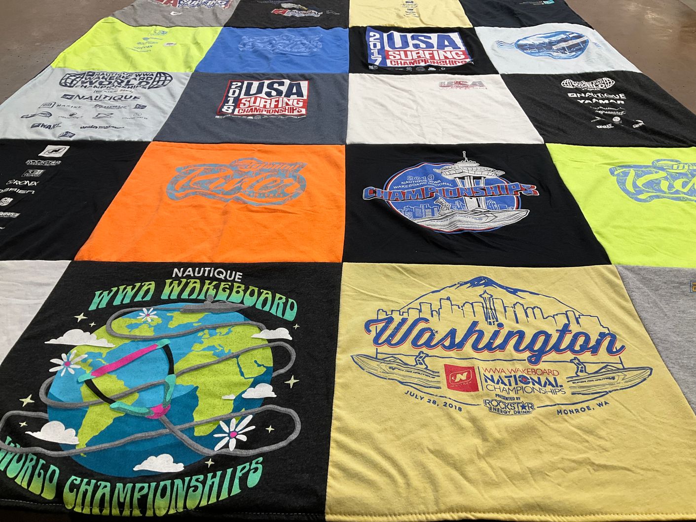 T-shirt quilt with water sports, surfing themes by Scott from CA