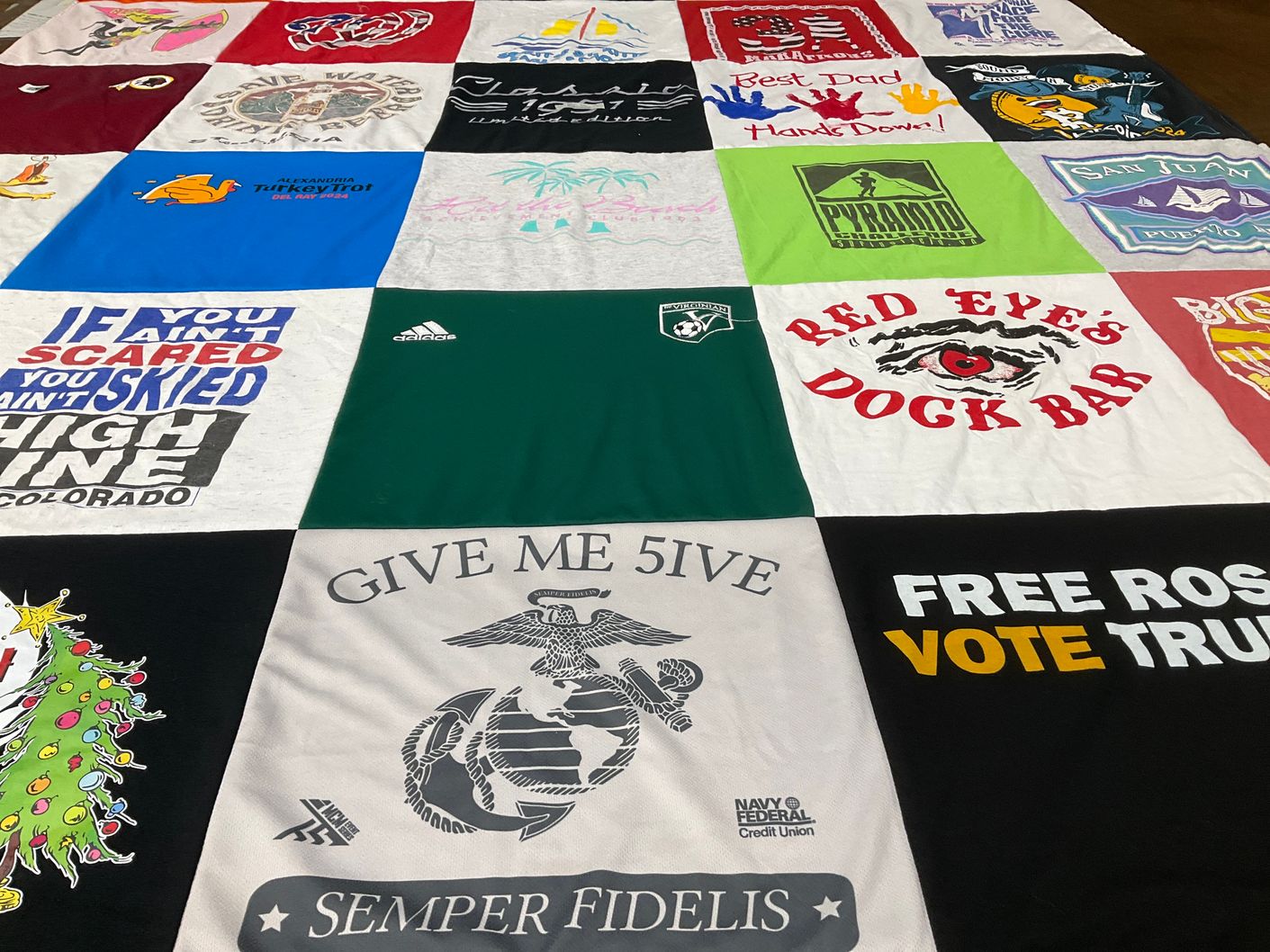 T-shirt quilt with skiing, military themes by Cathy from VA