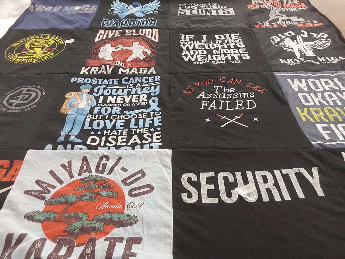 T-shirt quilt with martial arts, health awareness themes by Dave from IL