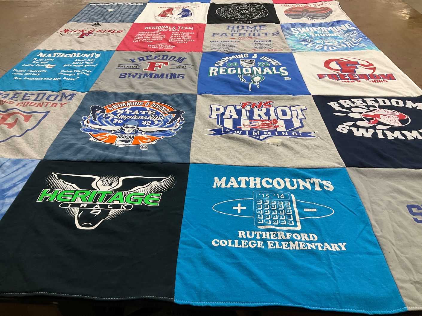 T-shirt quilt featuring freedom swimming, heritage track by Sara Lou from NC