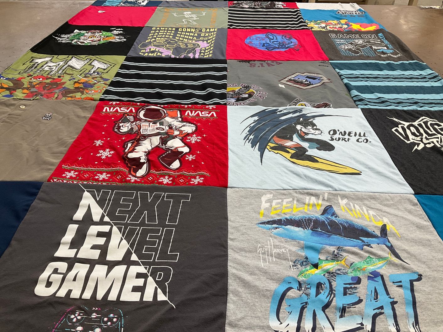 T-shirt quilt with gaming, space themes by Brijette from TX