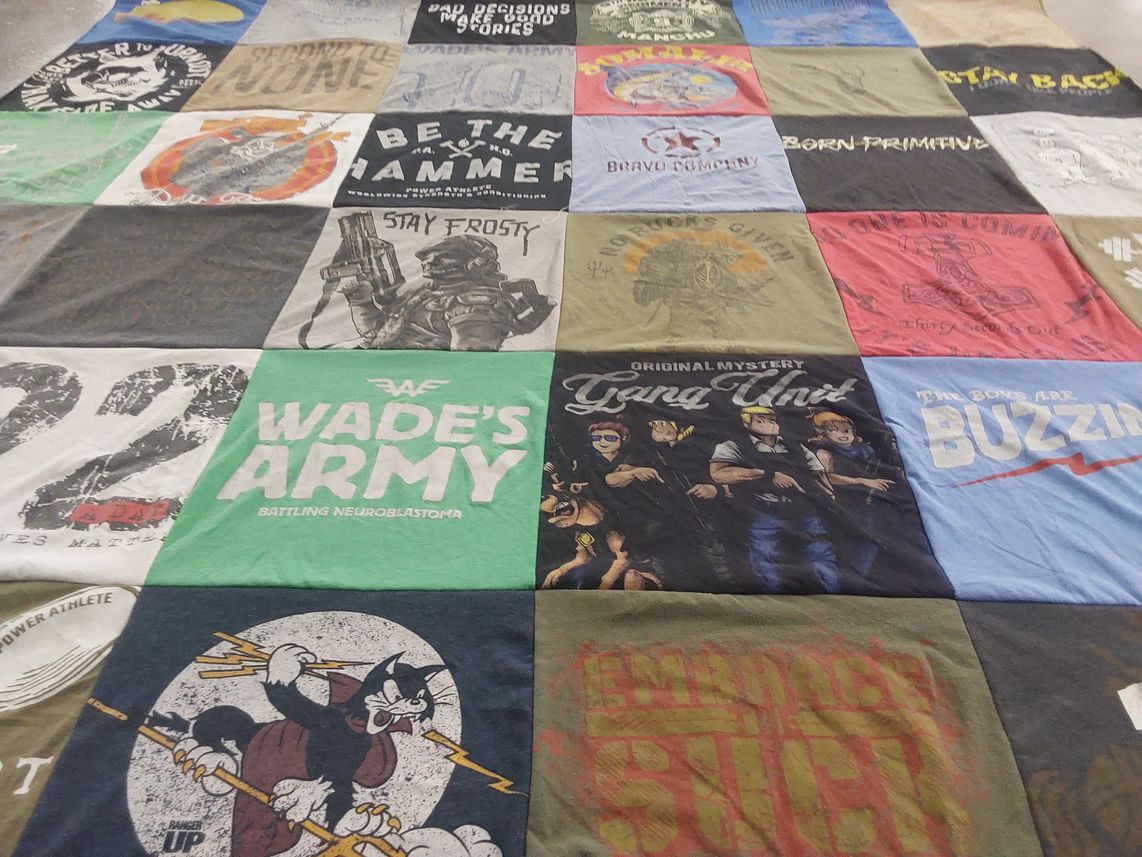 T-shirt quilt with gaming, comics themes by Travis from MT