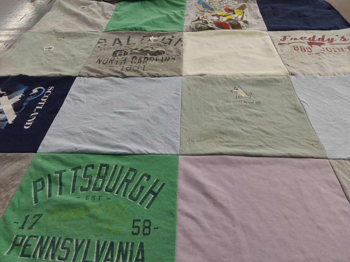 T-shirt quilt with travel, food themes by Amanda from MD