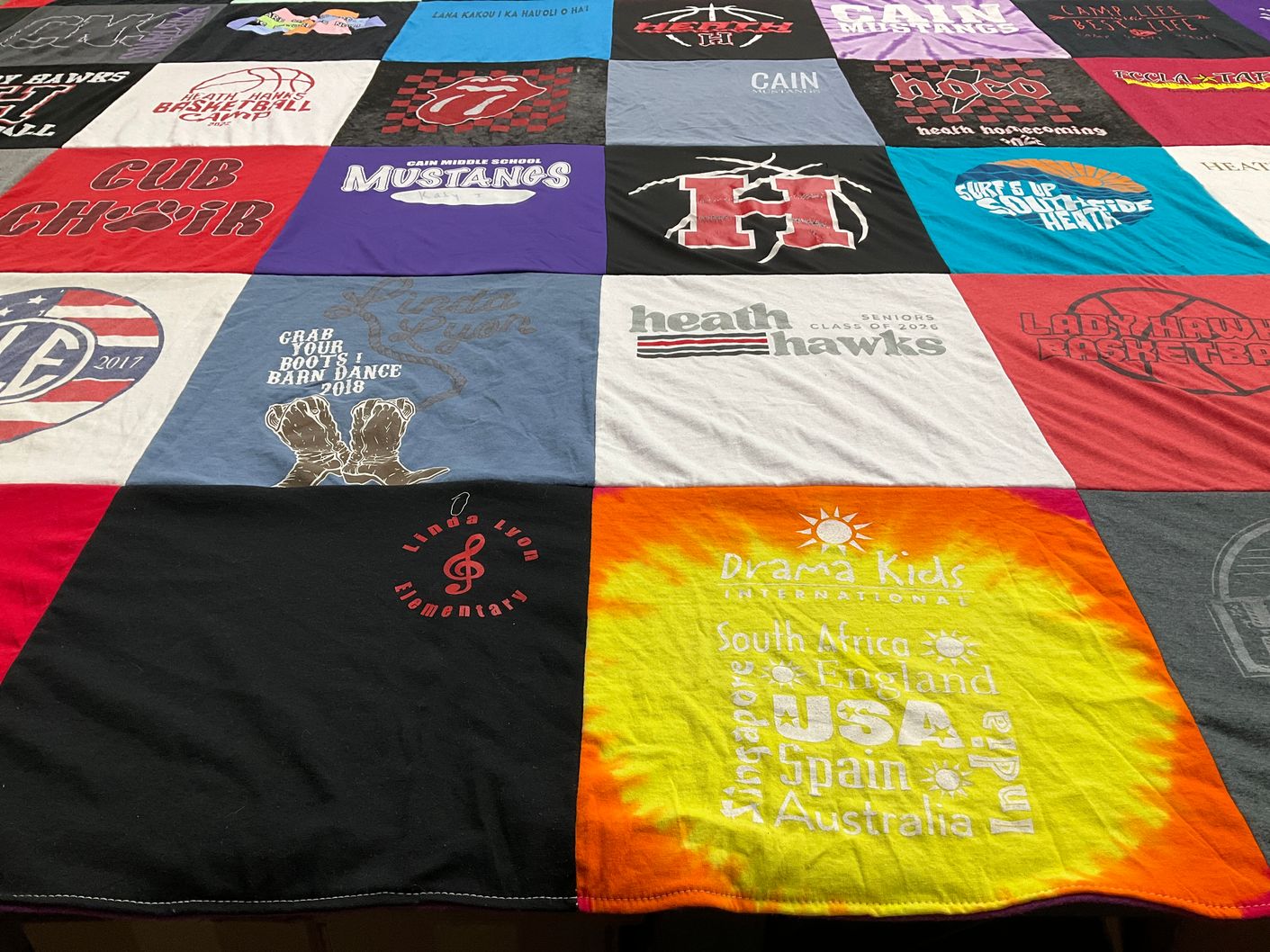 T-shirt quilt featuring heath hawks, cain middle school mustangs by Katy from TX