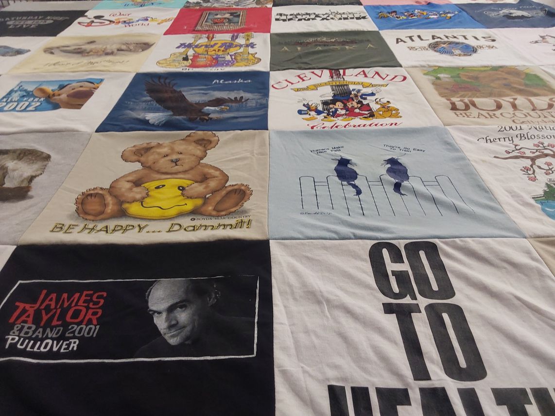 T-shirt quilt with health, music themes by Brenda from OH