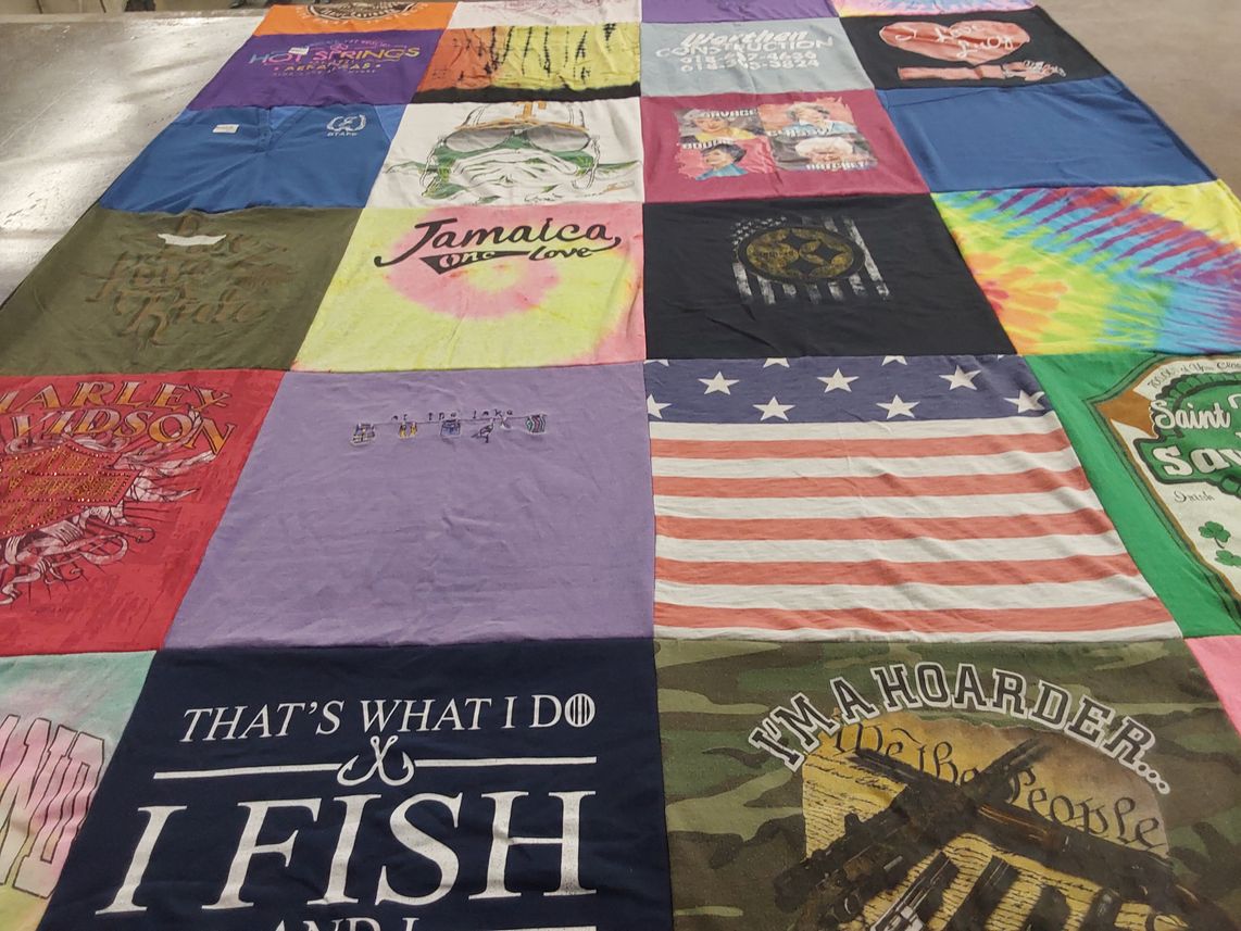 T-shirt quilt with fishing, travel themes by Kelsey from TN