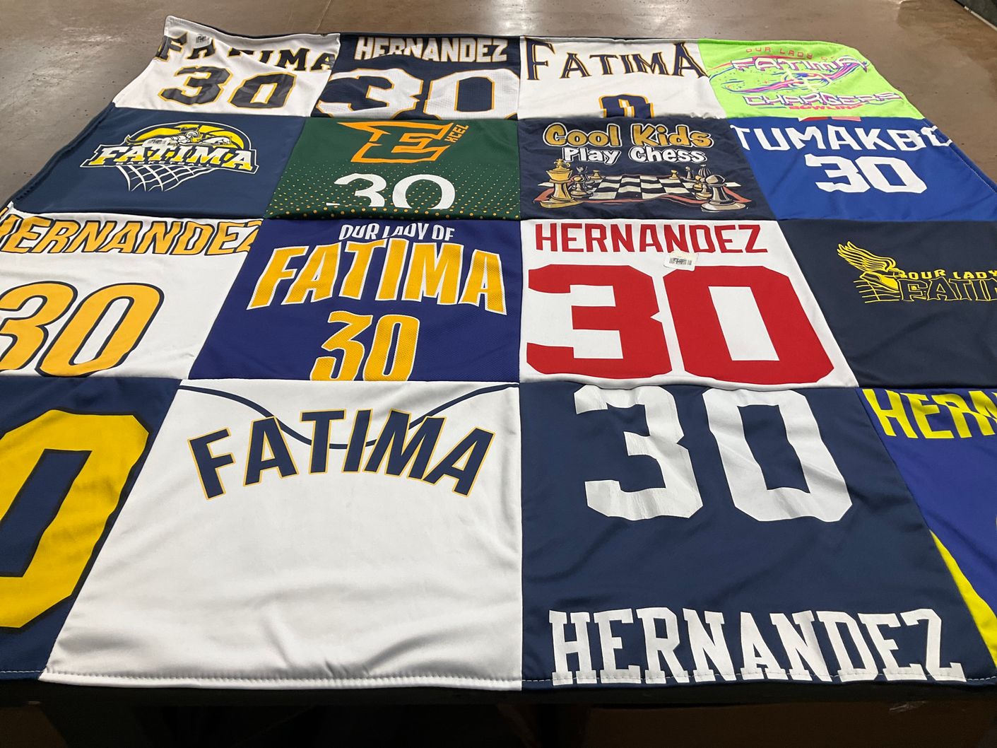 T-shirt quilt from our lady of fatima university by Margilane from CA