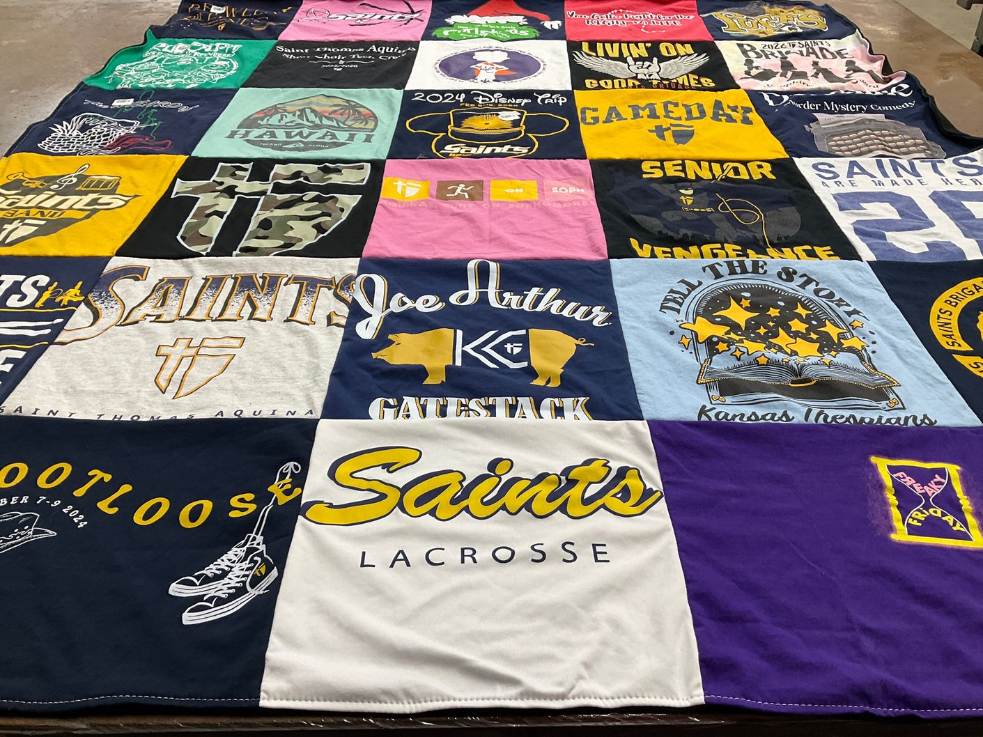 T-shirt quilt from saint thomas aquinas high school by Chris from KS