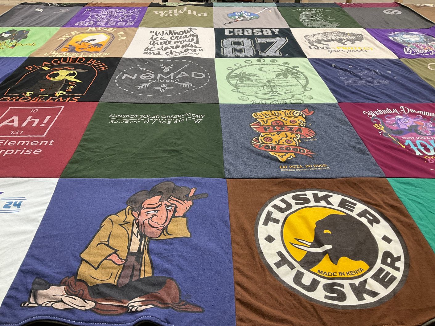 T-shirt quilt with pizza, astronomy themes by Jennifer from WA