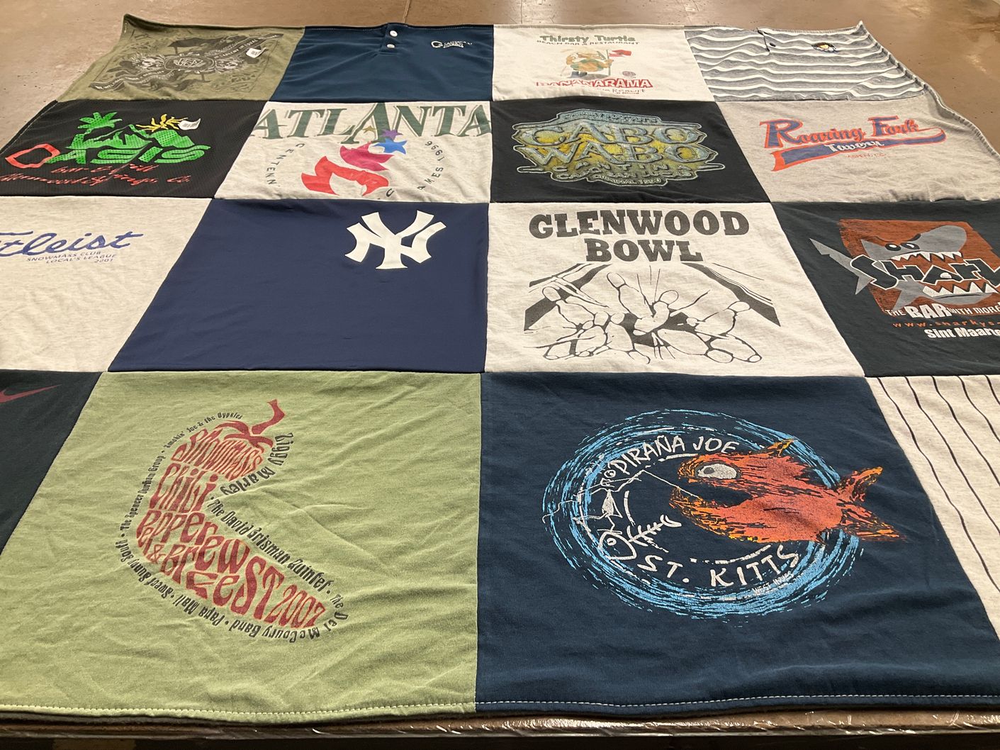 T-shirt quilt with fishing, bowling themes by Dorlene from FL