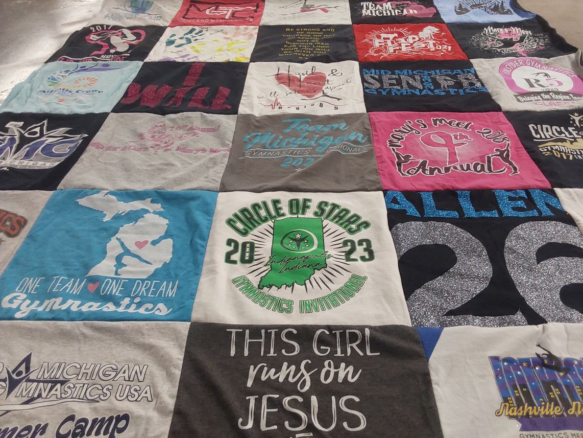 T-shirt quilt featuring circle of stars gymnastics invitational by Molly from MI
