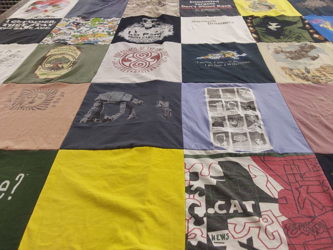 T-shirt quilt with art, comics themes by Shelley from VA