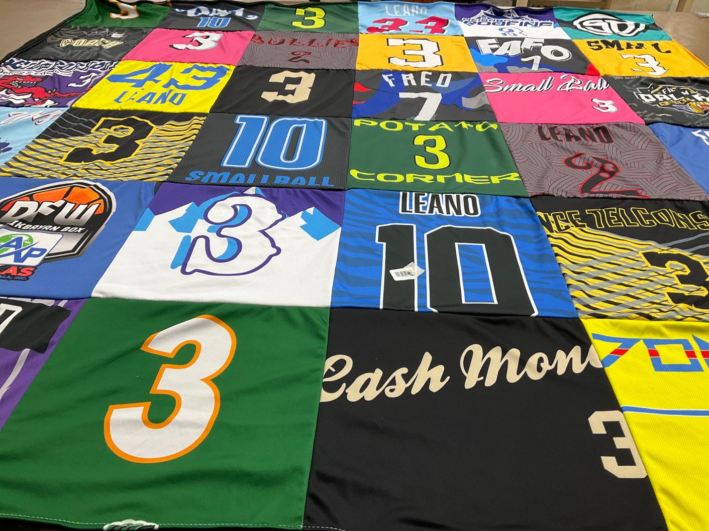 T-shirt quilt with sports, basketball themes by Madonna from TX