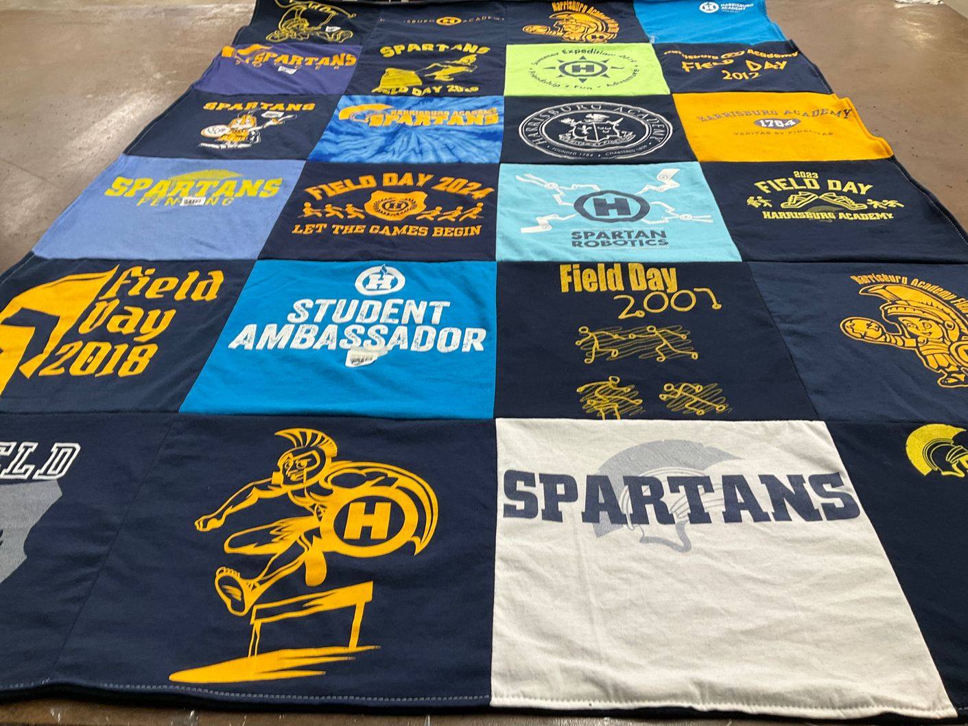T-shirt quilt featuring harrisburg academy spartans by Kari from PA
