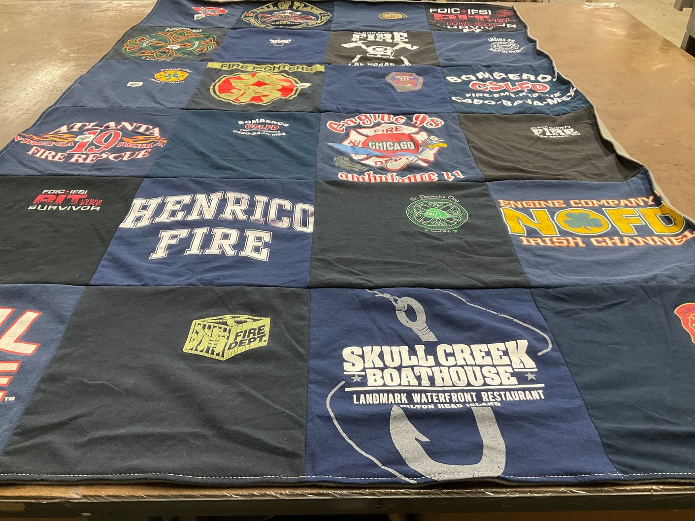 T-shirt quilt with firefighting themes by Liz from VA