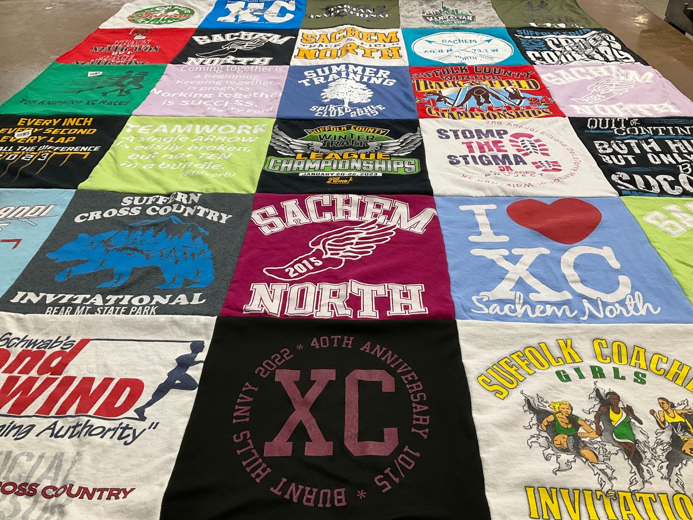 T-shirt quilt featuring sachem north cross country, suffern cross country by Lauren from NY