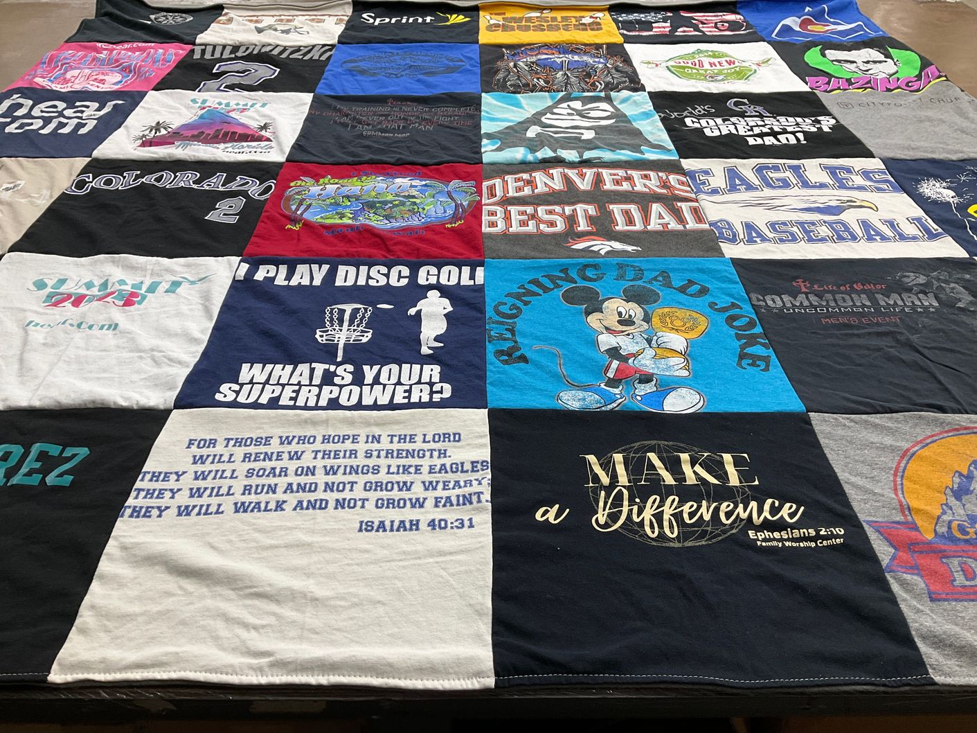 T-shirt quilt with disc golf, superheroes themes by THOMAS from CO