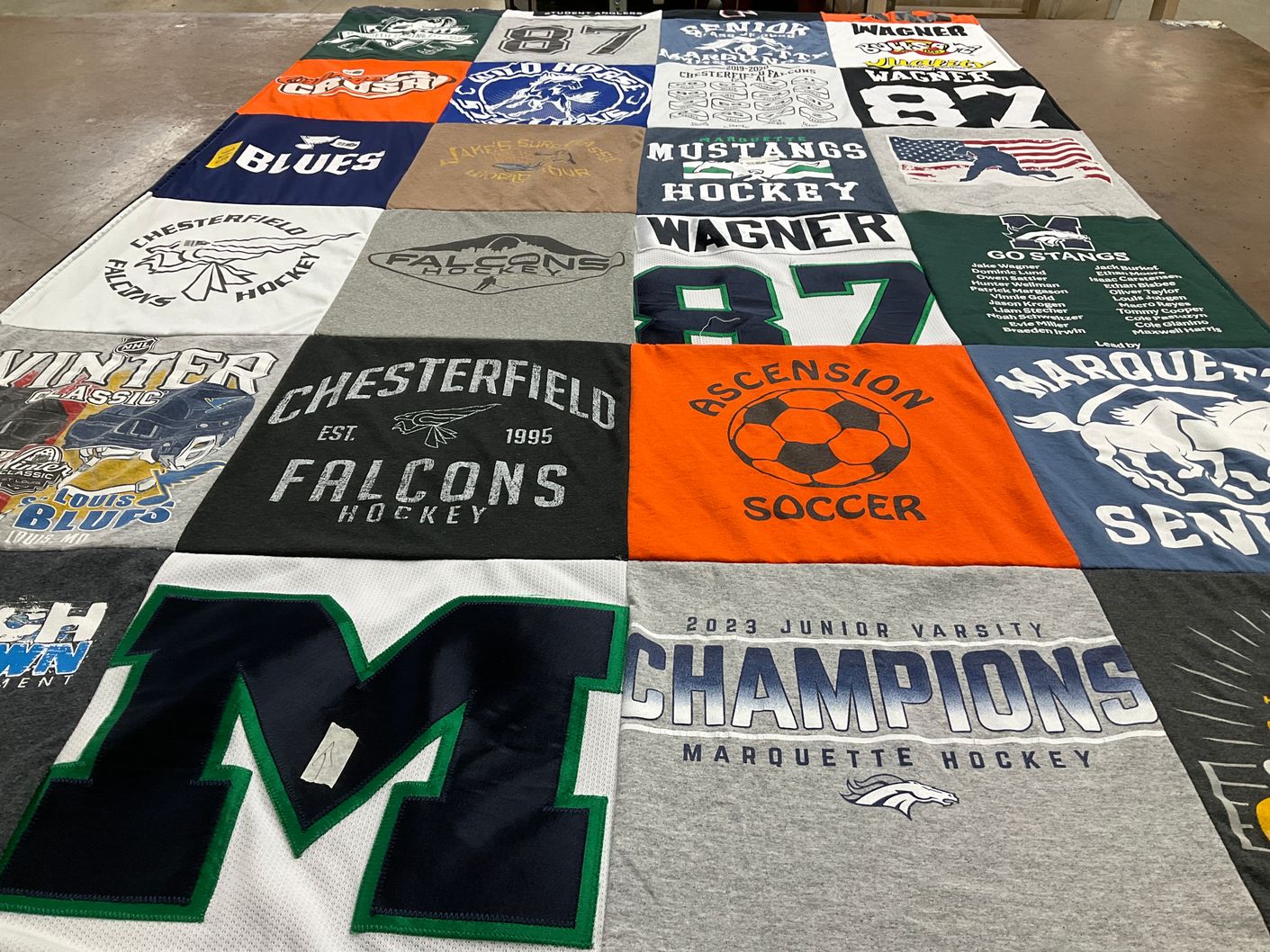 T-shirt quilt featuring chesterfield falcons hockey, marquette hockey by Angela from MO