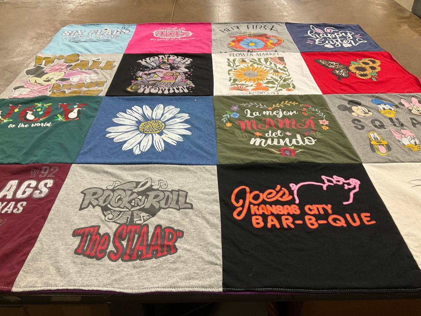 T-shirt quilt with amusement parks, music themes by Margarita from TX