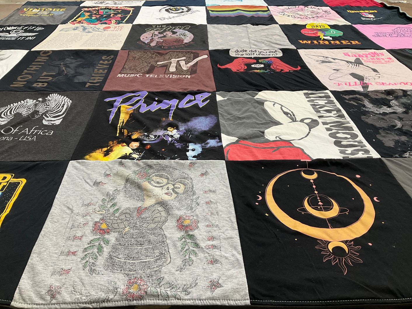 T-shirt quilt with music, art themes by Claudia from NY