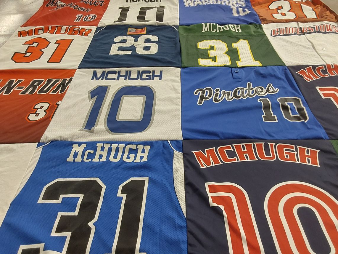 T-shirt quilt with sports themes by Pamela from NY
