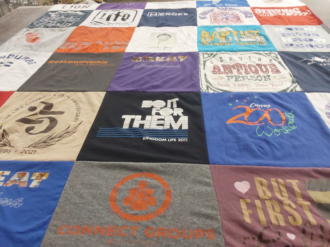 T-shirt quilt with community, fitness themes by Alicia from TN
