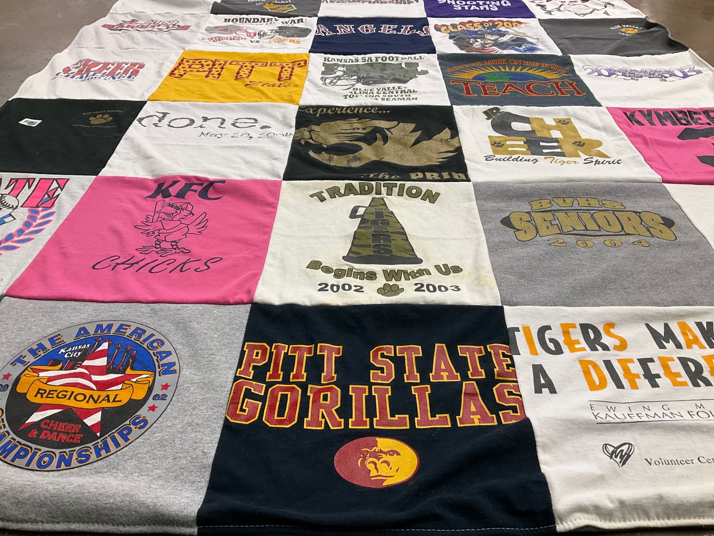 T-shirt quilt featuring pittsburg state gorillas, blue valley high school tigers by Kymberly from KS