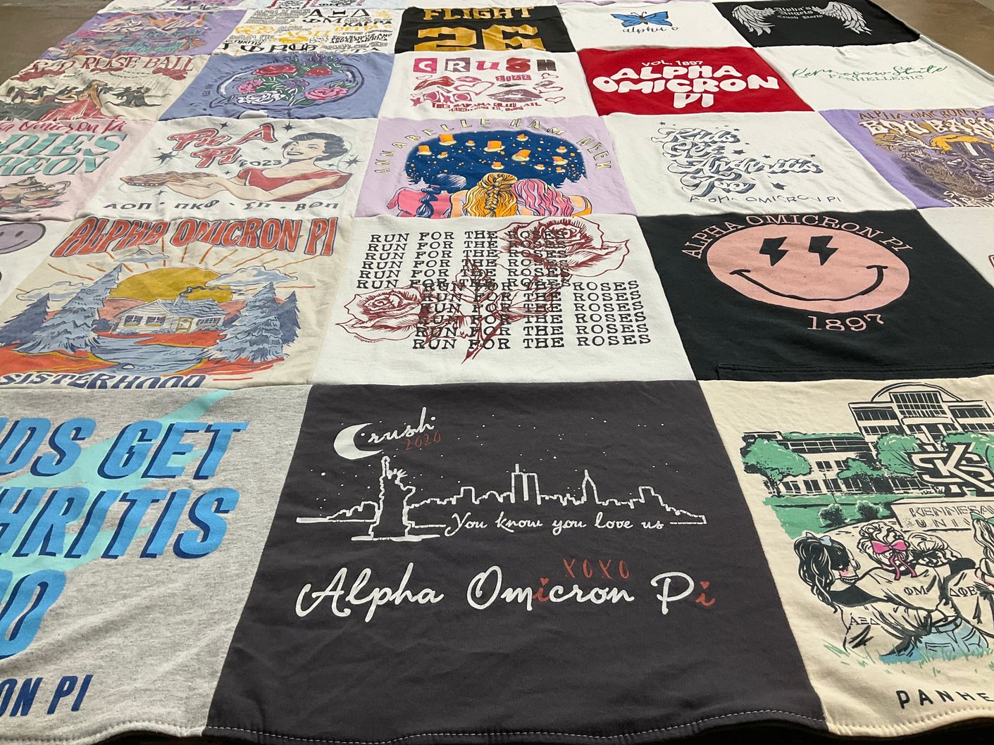 T-shirt quilt with sisterhood, community themes by Shawn from GA