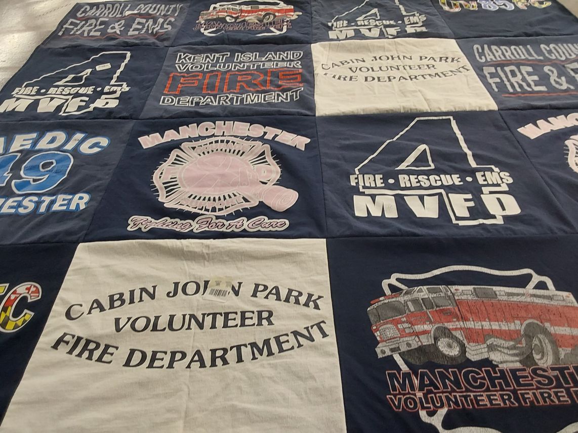 T-shirt quilt with firefighting, volunteering themes by Corinne from MD