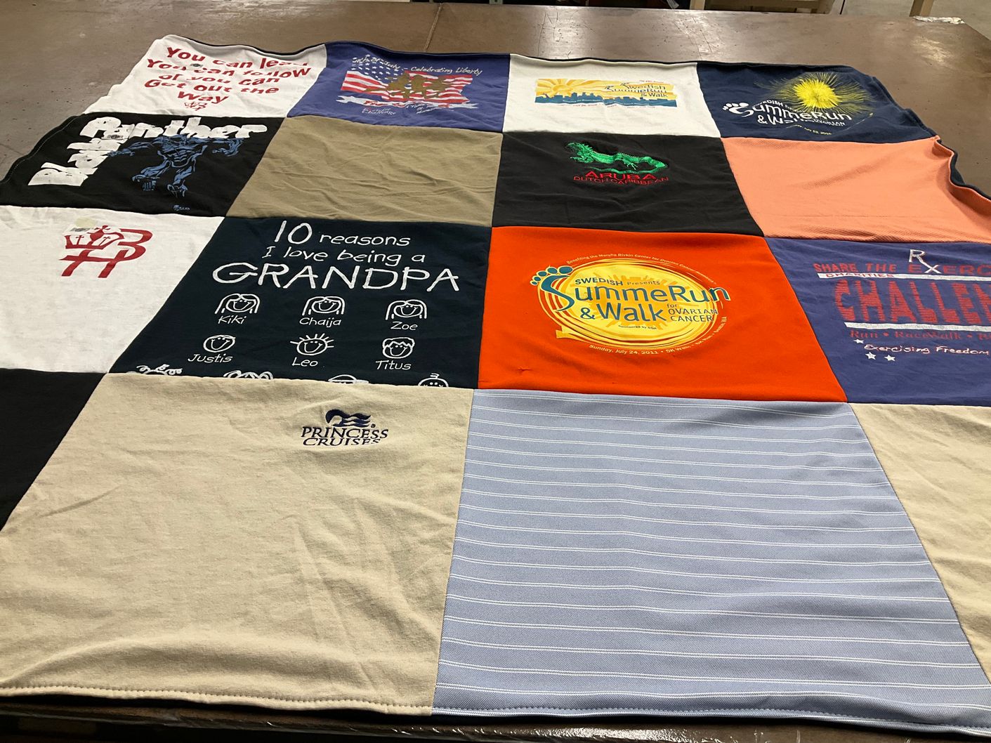 T-shirt quilt with family, running themes by Kathy from AZ