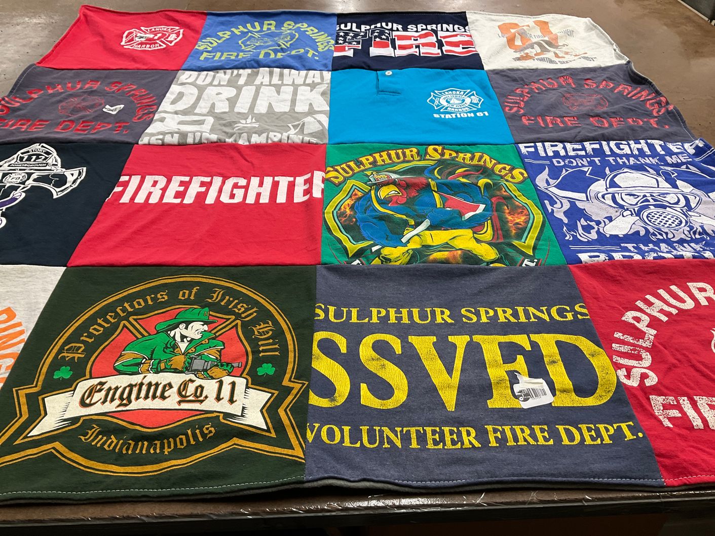 T-shirt quilt with firefighting themes by Bruce from TN