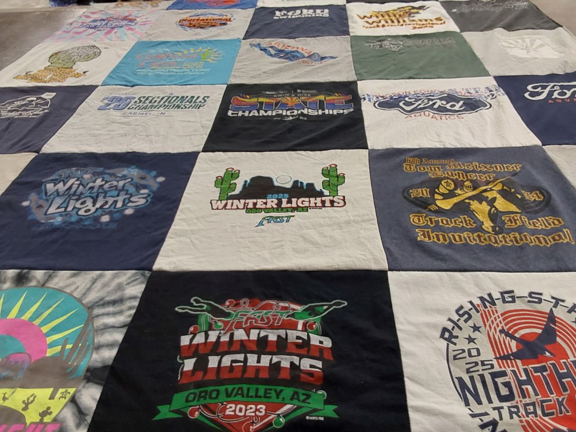 T-shirt quilt with sports, track and field themes by Jeannette from AZ