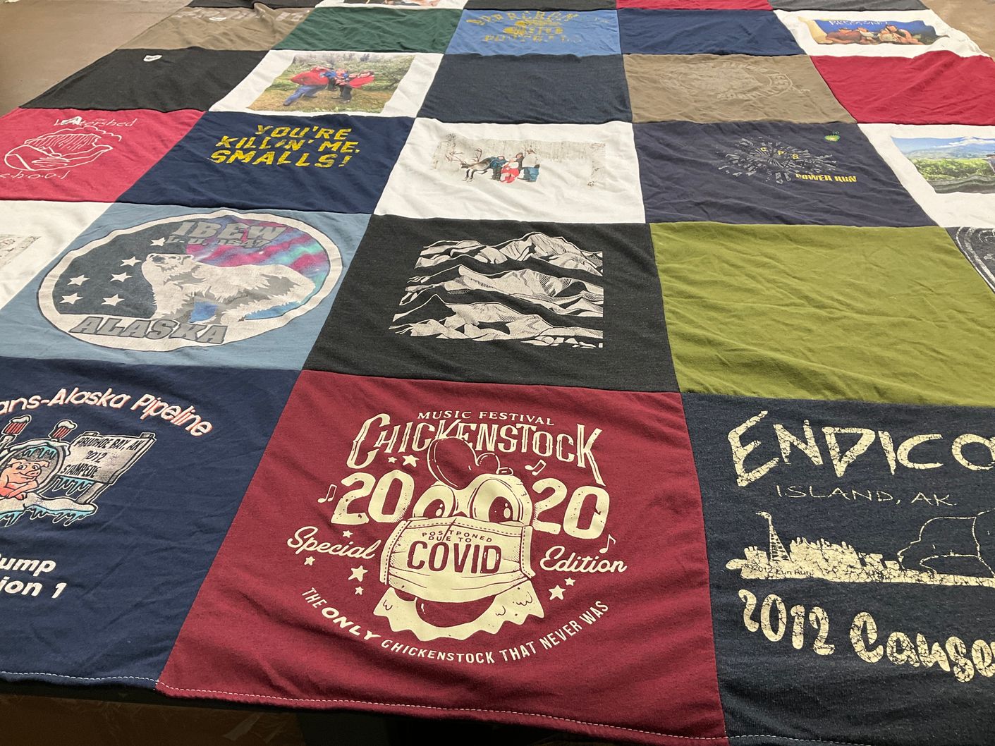 T-shirt quilt with music festivals, alaska themes by Virginia from AK
